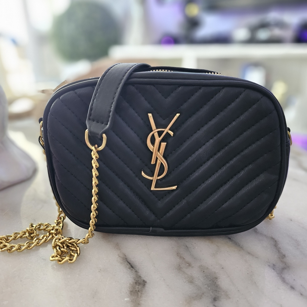 Elegant Black Crossbody Bag with Gold Accents